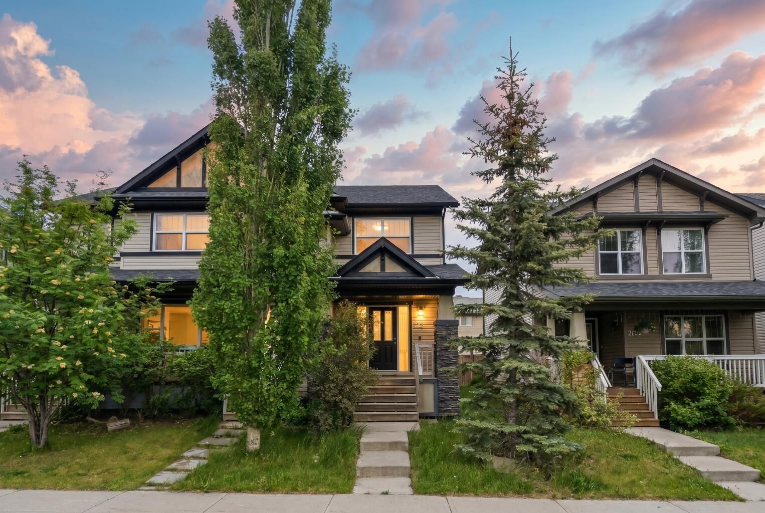 Property Photo: 212 Panatella Drive NW AB T3K 0T4