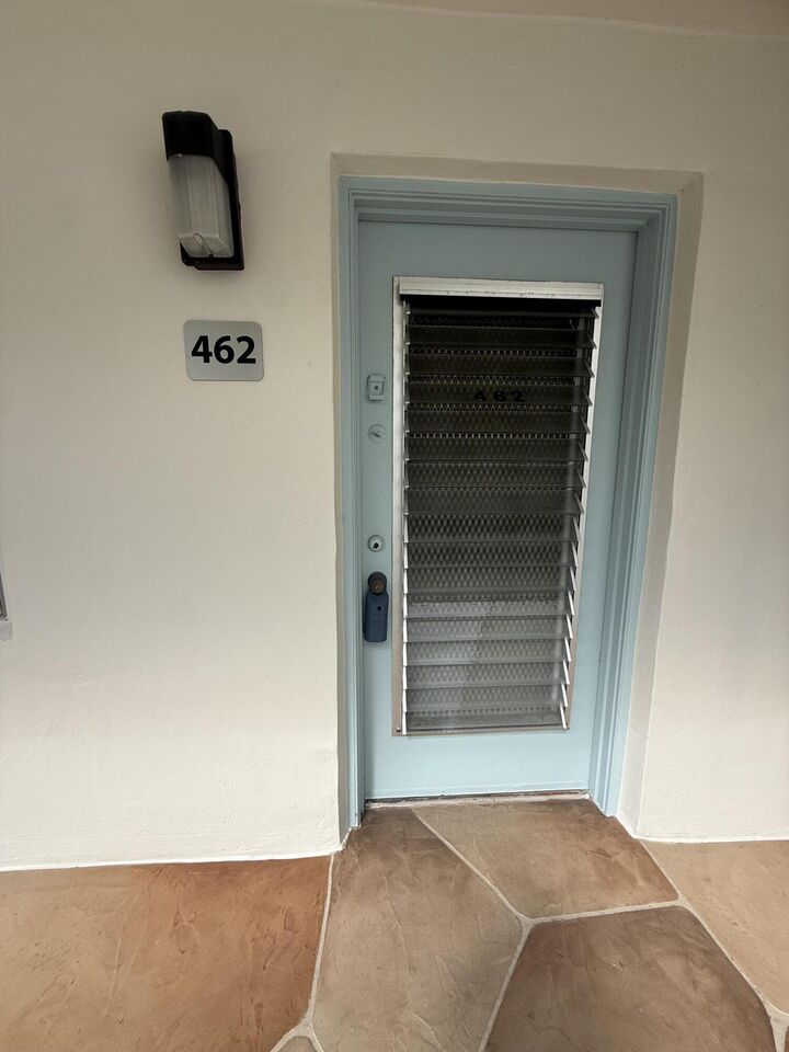 Property Photo:  462 Normandy J  FL 33484 