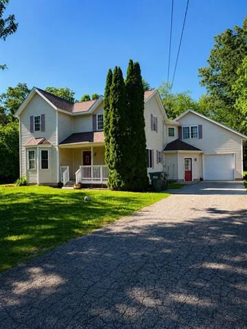 Property Photo: 9050 Almena Drive MI 49009