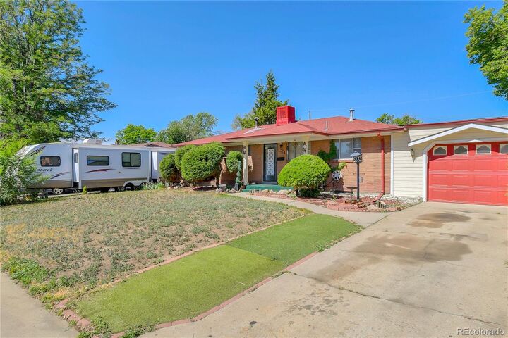 Property Photo: 7477 Canosa Court CO 80030