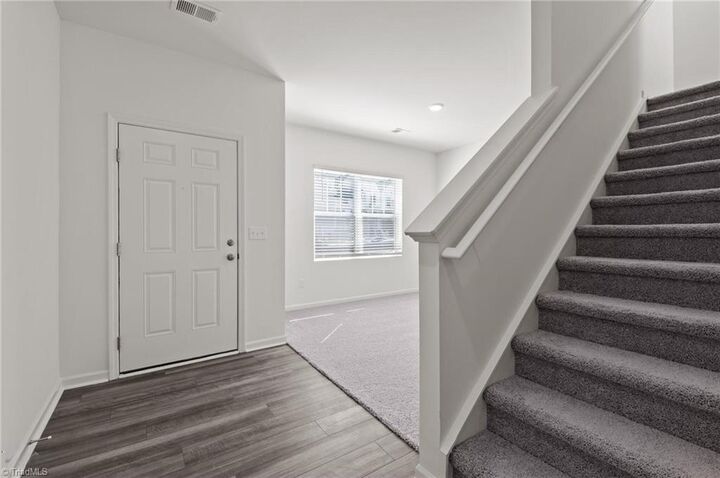 Property Photo:  1002 Riverbank Drive  NC 27284 