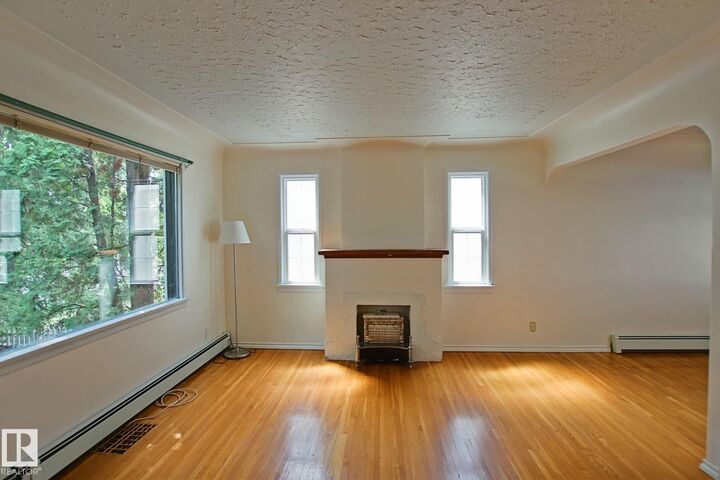 Property Photo: 11242 56 Street NW AB T5W 3S2