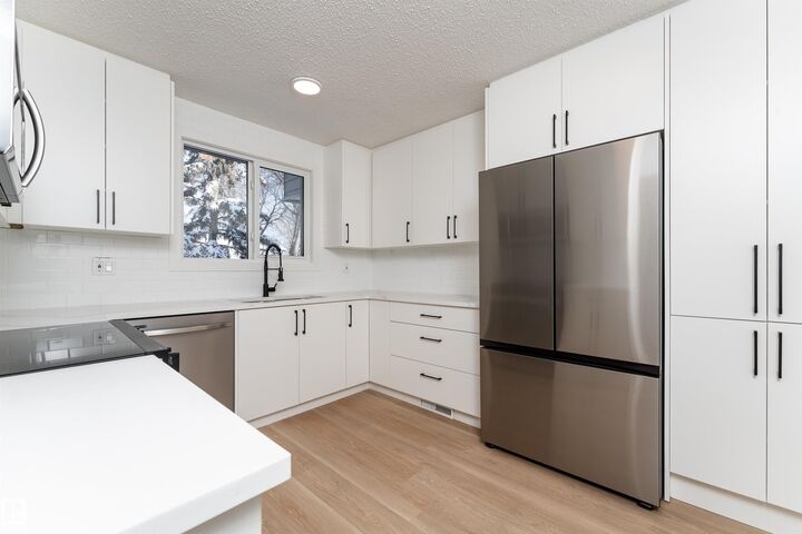 Property Photo:  3108 142 Avenue NW  AB T5Y 1H2 
