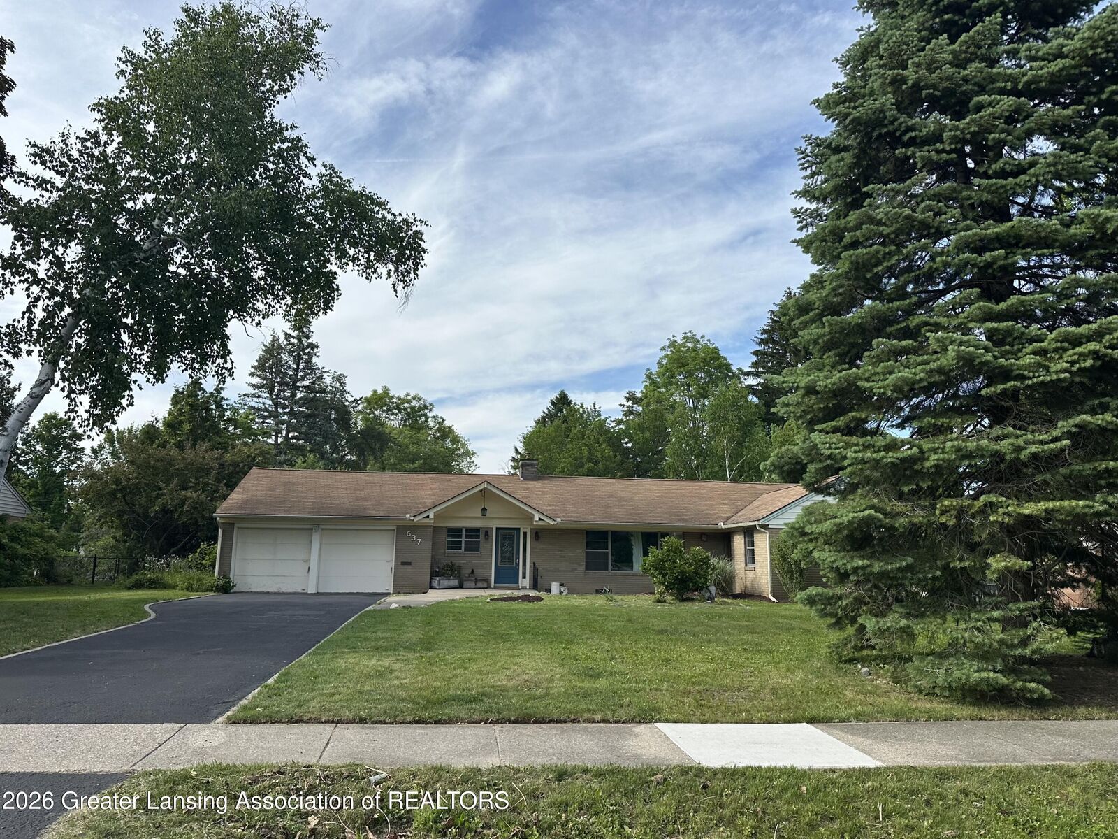 Property Photo: 637 Whitehills Drive MI 48823