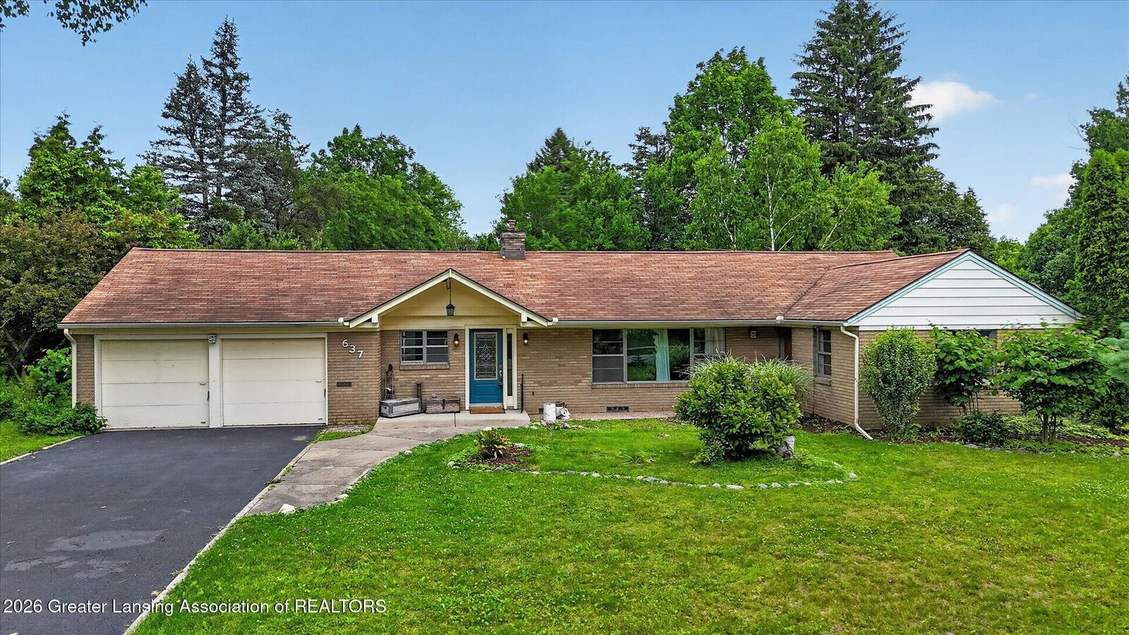 Property Photo:  637 Whitehills Drive  MI 48823 