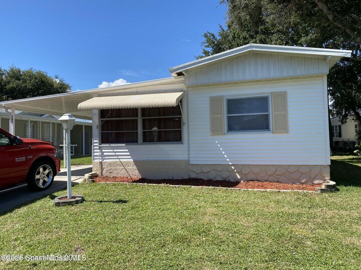 Property Photo: 703 Lark Drive FL 32976