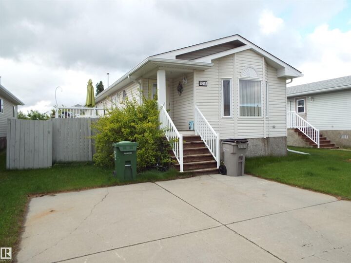 Property Photo: 1015 Aspen Drive AB T9E 8R5