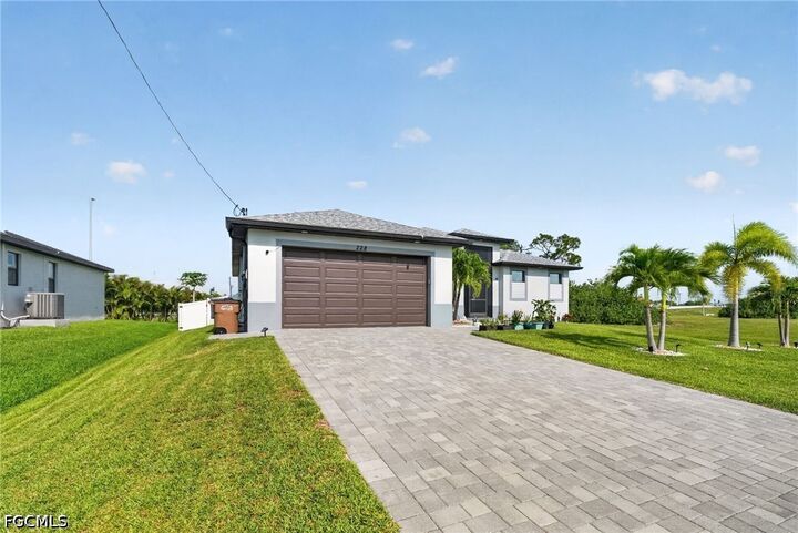 Property Photo: 228 SW 31st Place FL 33991