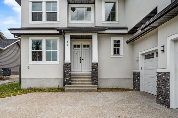 Property Photo: 22 Cimarron Estates Gate AB T1S 0M9
