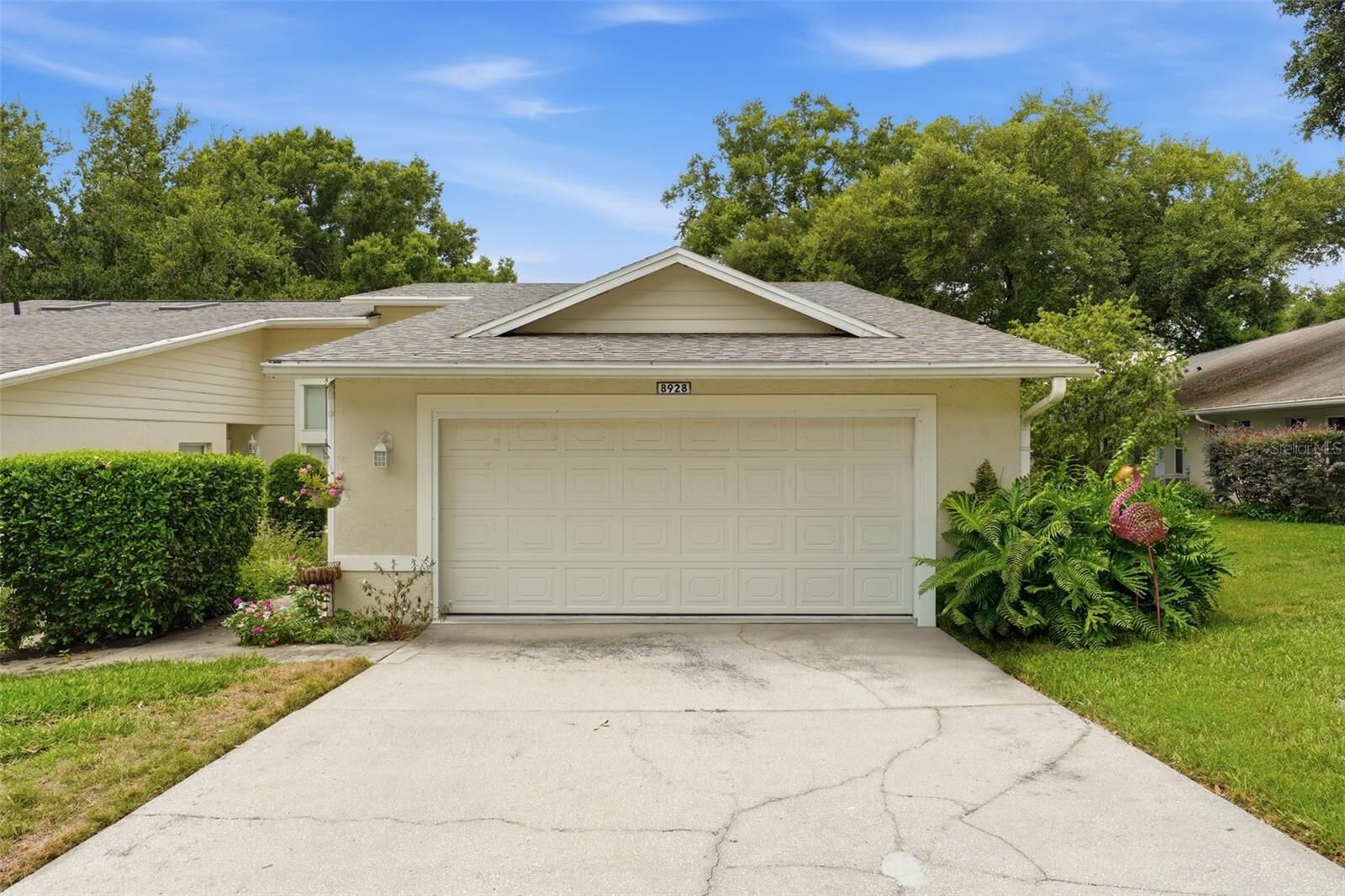 Property Photo:  8928 Village Green Boulevard  FL 34711 
