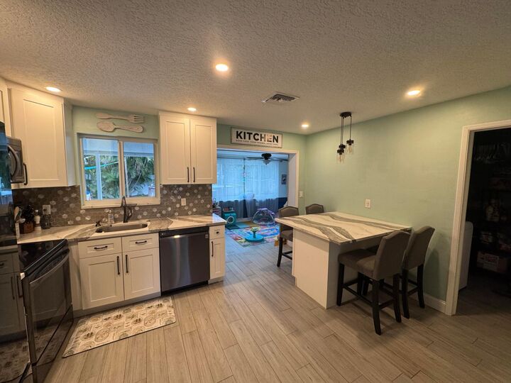 Property Photo:  60 NE 46th Street  FL 33334 