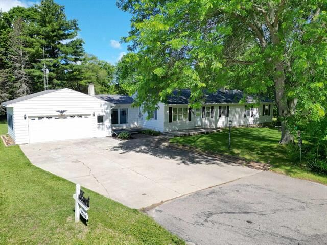 Property Photo:  7099 N Henderson Road  MI 48420 