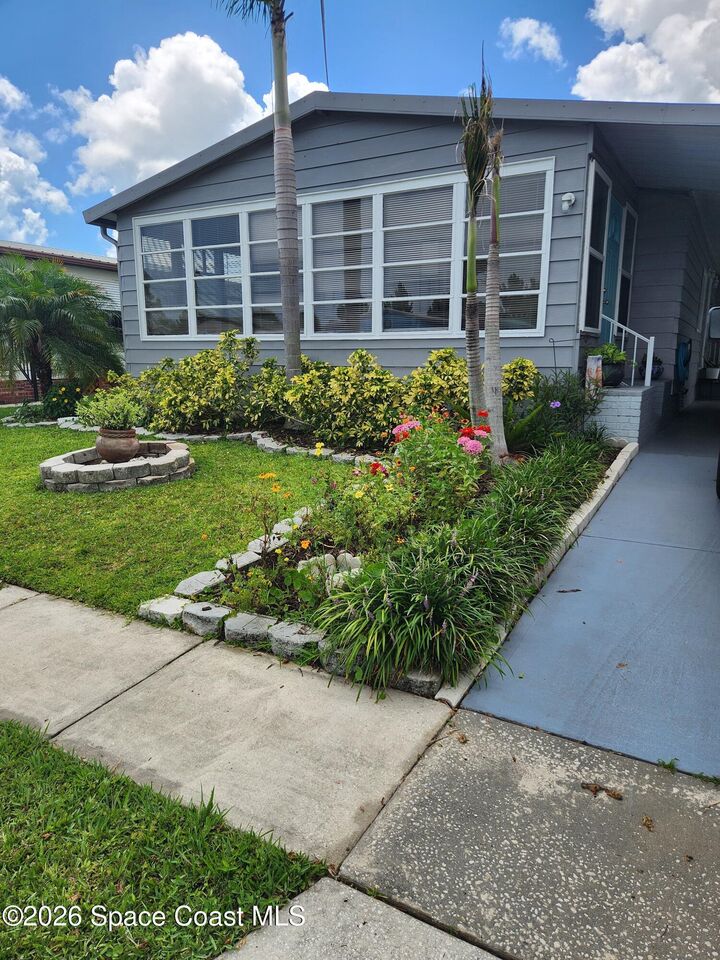 Property Photo: 2310 Coconut Palm Drive NE FL 32905