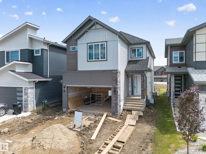 Property Photo: 8915 Mayday Way SW AB T6X 3E9