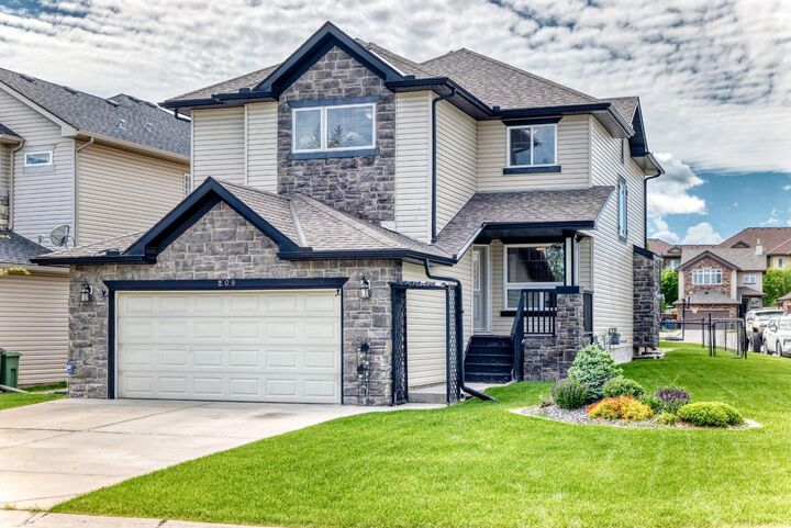 Property Photo: 209 Crystal Green Point AB T1S 2K7