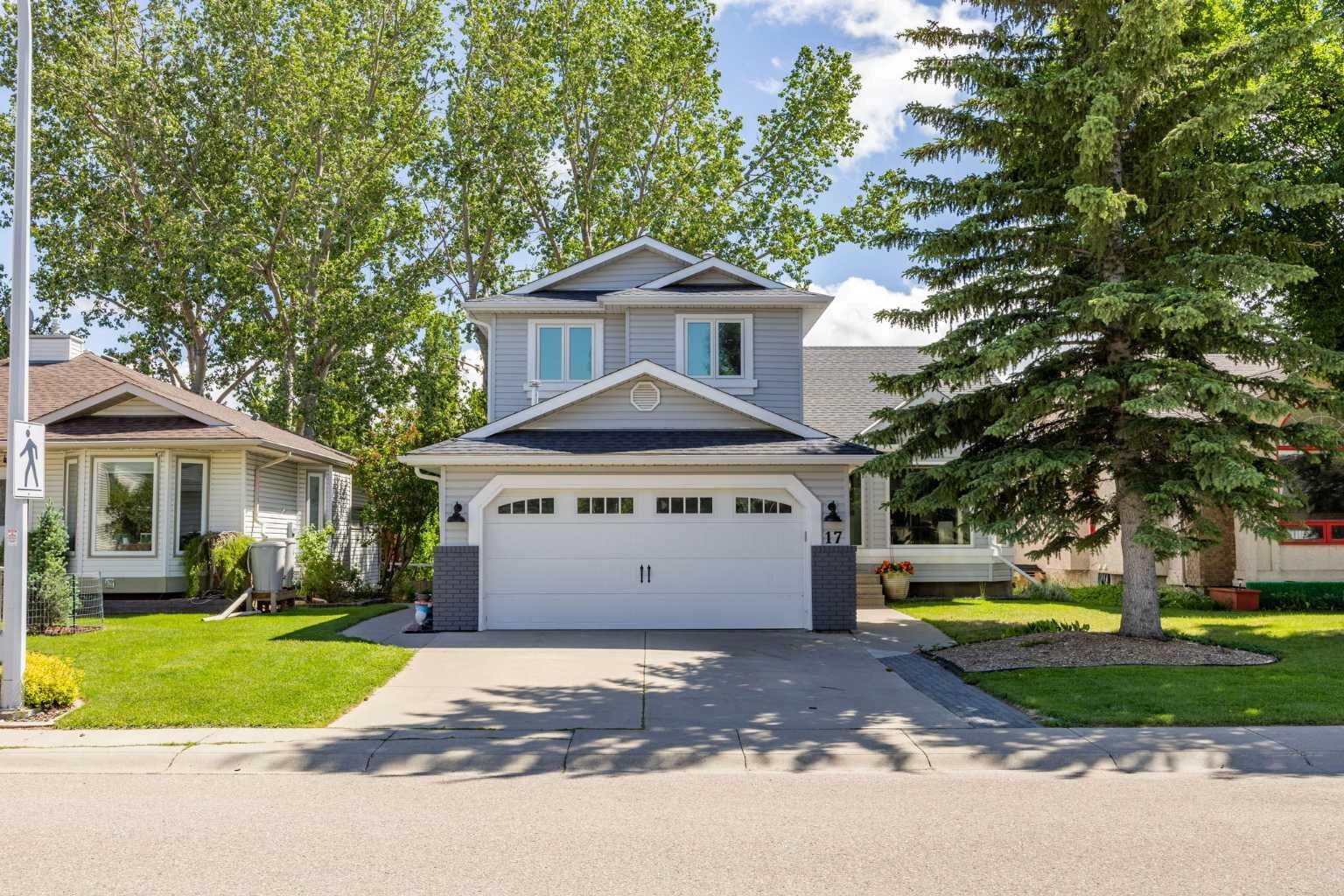 Property Photo:  17 Sunset Crescent  AB T1S 1M6 