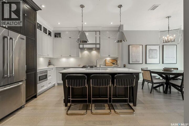 Property Photo:  107 404 Cartwright Street  SK S7T 0W6 