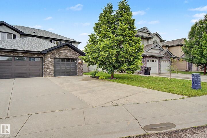 Property Photo:  5628 1A Avenue SW  AB T6X 0K9 