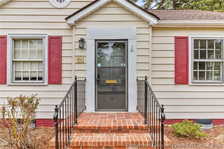 Property Photo:  211 Hull Road  NC 28303 
