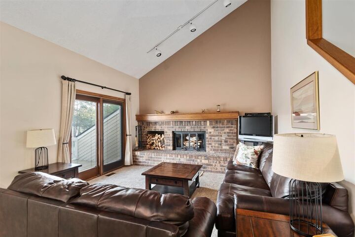 Property Photo:  4680 Camelot 23  MI 49740 