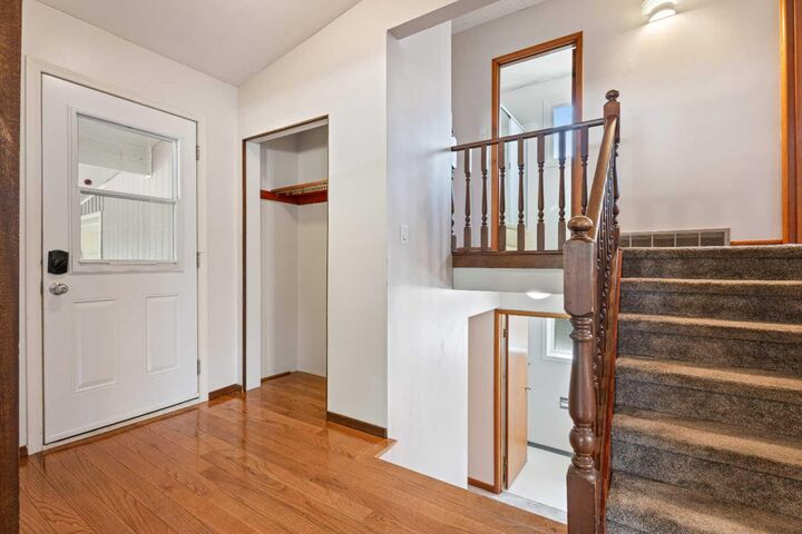 Property Photo:  77 Winslow Crescent SW  AB T3C 2R3 