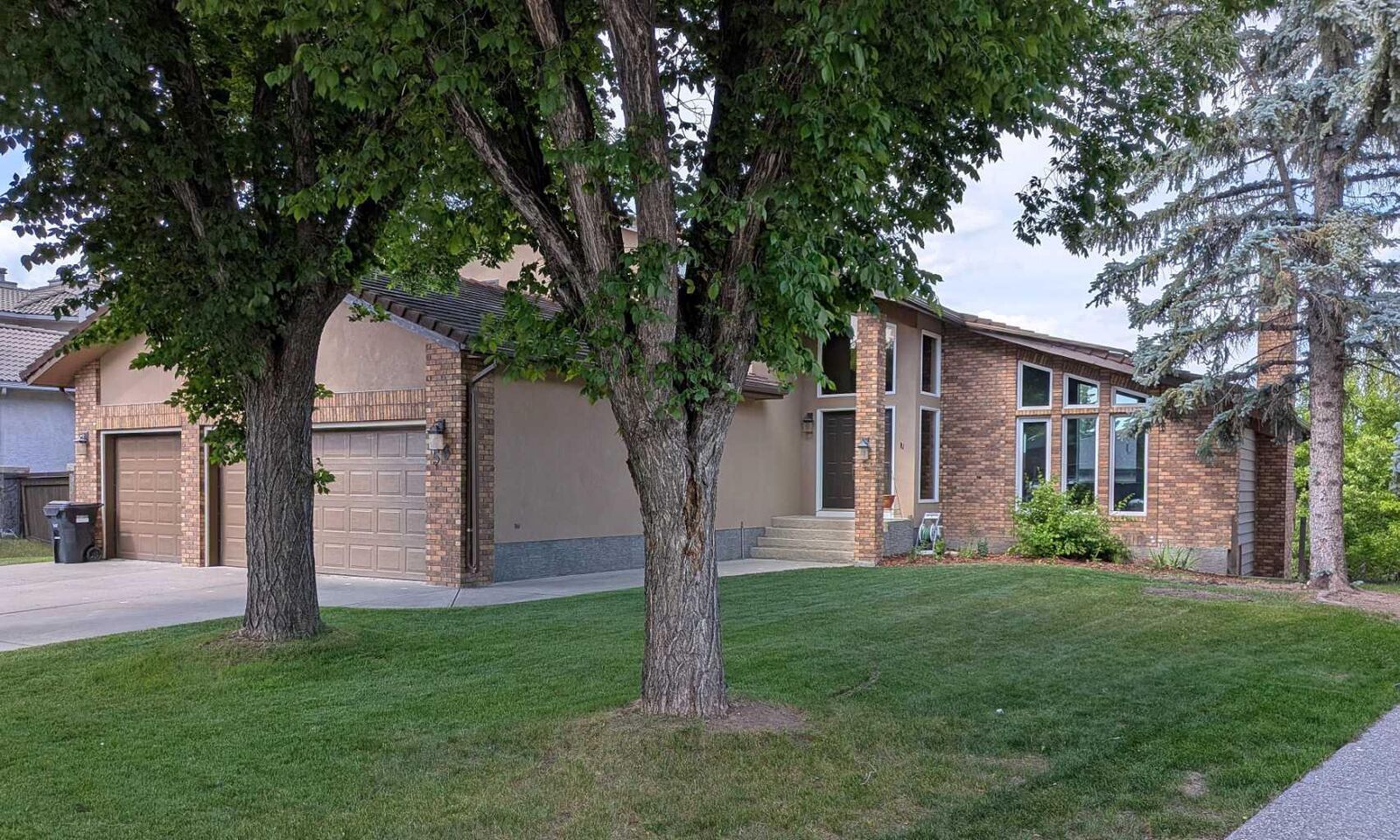 Property Photo: 56 Patterson Crescent SW AB T3H 1T1