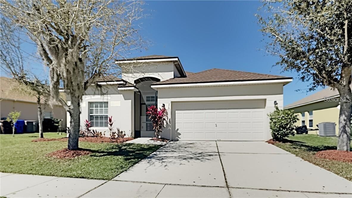 Property Photo:  876 Hacienda Circle  FL 34741 