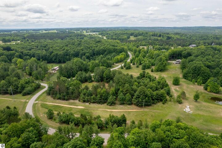 Property Photo:  5502 Paradise Ranch  MI 49649 