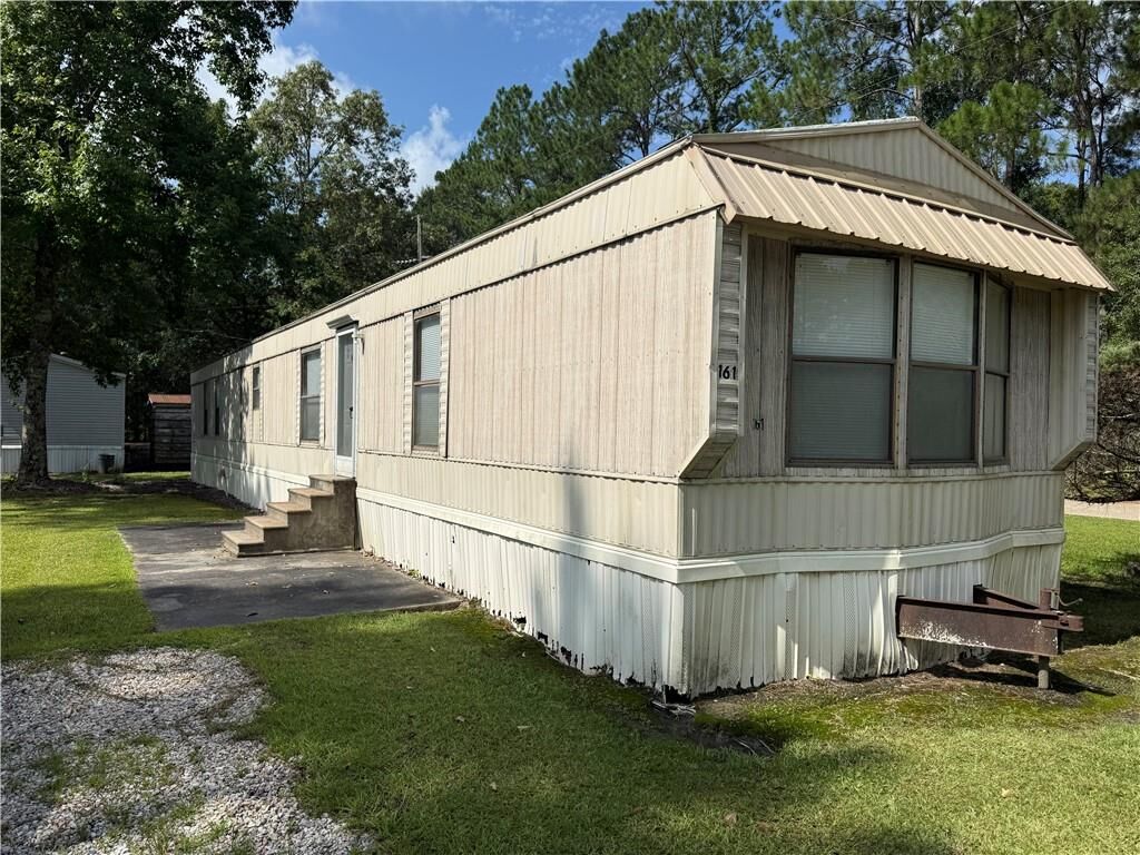 Property Photo: 64096 Mangano Road 161 LA 70452