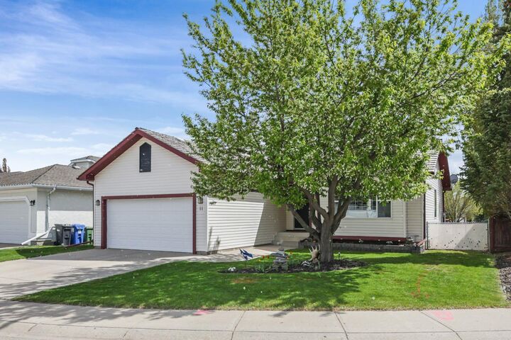 Property Photo: 11 Strathmore Lakes Crescent AB T1P 1L7