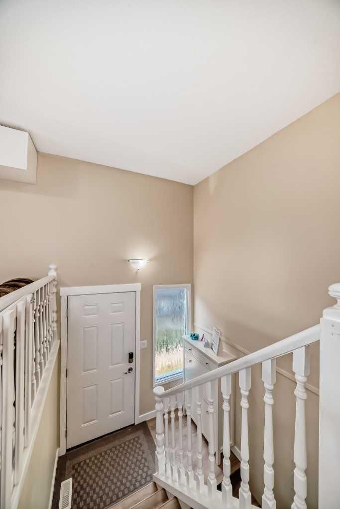 Property Photo:  109 Stanley Avenue C  AB T1S 1H8 