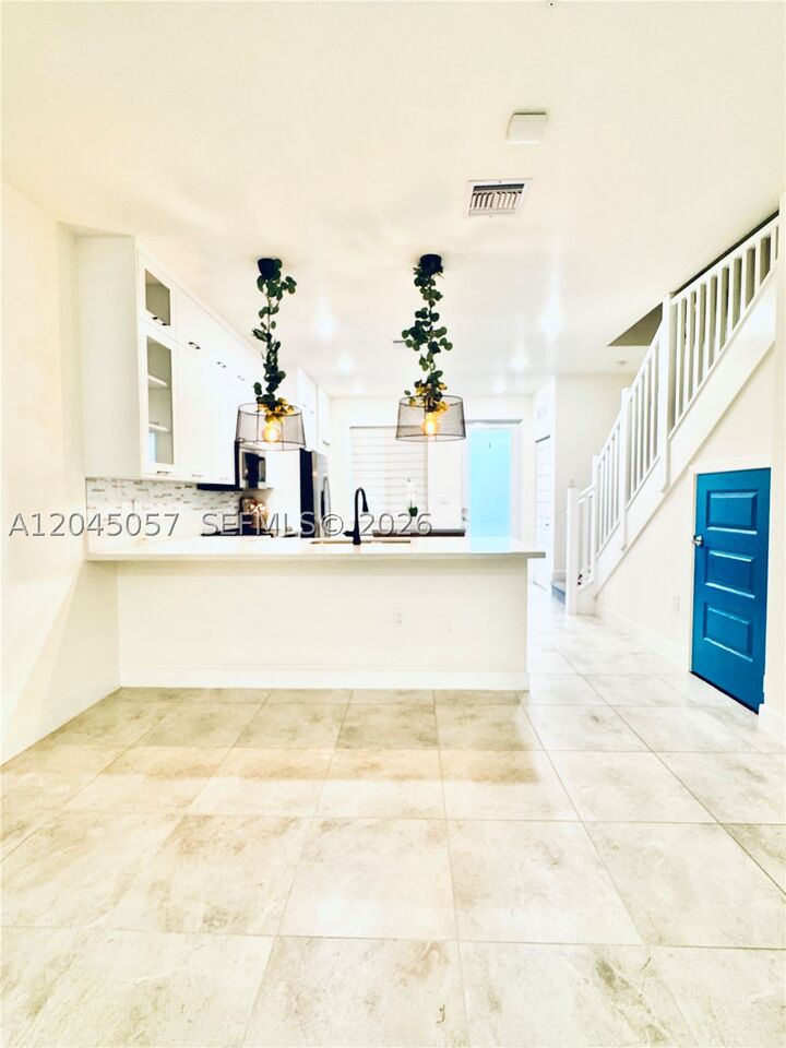 Property Photo: 10295 NW 64th Ter 104 FL 33178