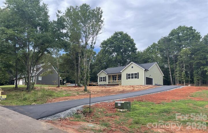 Property Photo:  321 Whispering Pines Circle  NC 28043 