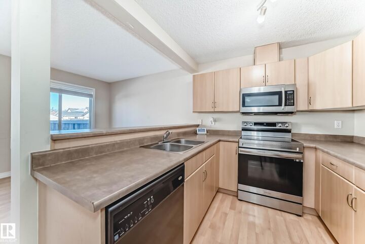 Property Photo:  5922 164 Avenue NW  AB T5Y 0B3 