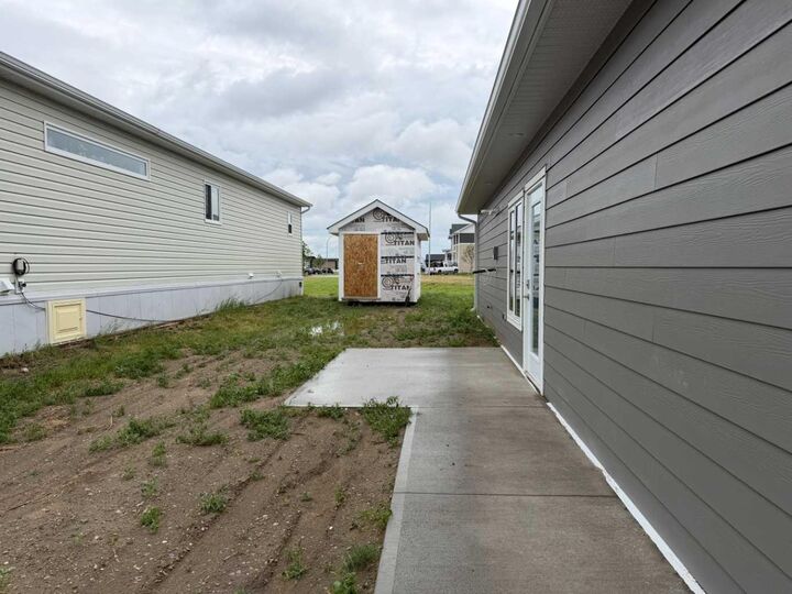 Property Photo: 10 Meadows Way AB T1G 2A2
