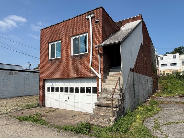 Property Photo:  816-818 McKean  PA 15033 