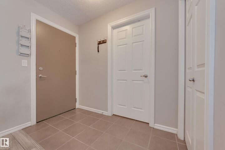 Property Photo: 4403 23 Street NW 213 AB T6T 0E4