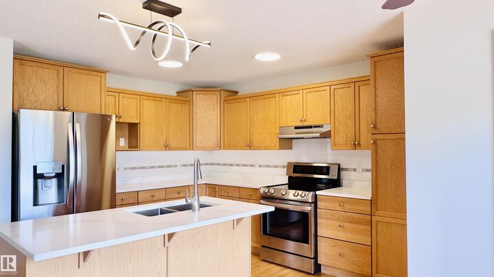 Property Photo:  4811 152 Avenue NW  AB T5Y 3B8 