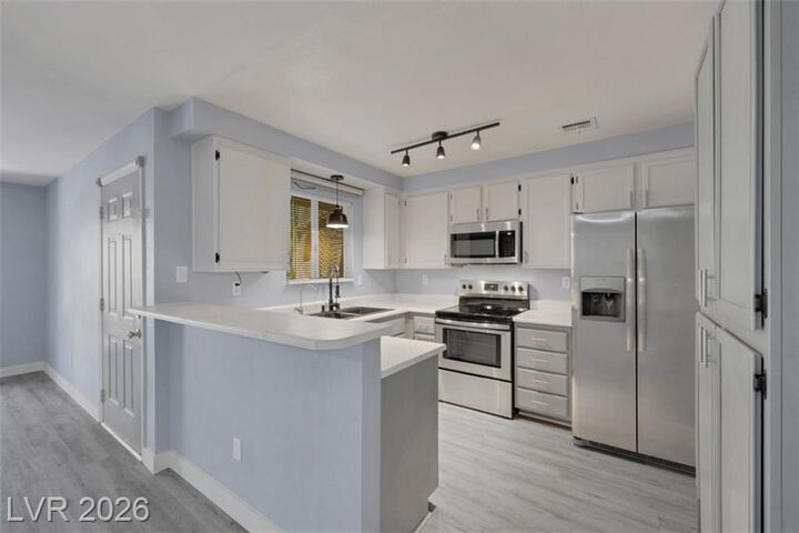 Property Photo:  6869 Tamarus Street 202  NV 89119 