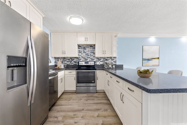 Property Photo: 98-707 Iho Place 2/402 HI 96701