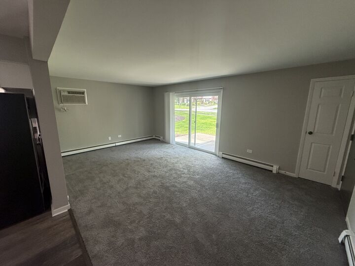 Property Photo: 1121 Chalet Drive 1W IL 60561