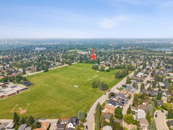 Property Photo: 856 Lake Twintree Crescent SE AB T2J 2W3