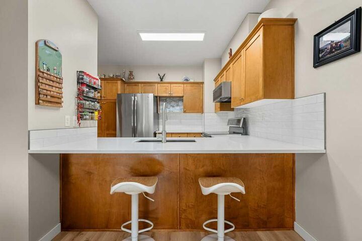 Property Photo: 720 Willowbrook Road NW 1204 AB T4B 2Y9