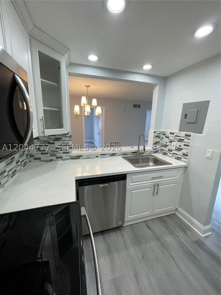 Property Photo:  13685 NE 10th Ave 301  FL 33161 
