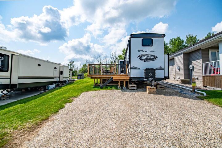 Property Photo:  25054 South Pine Lake Road 6112  AB T0M 1S0 