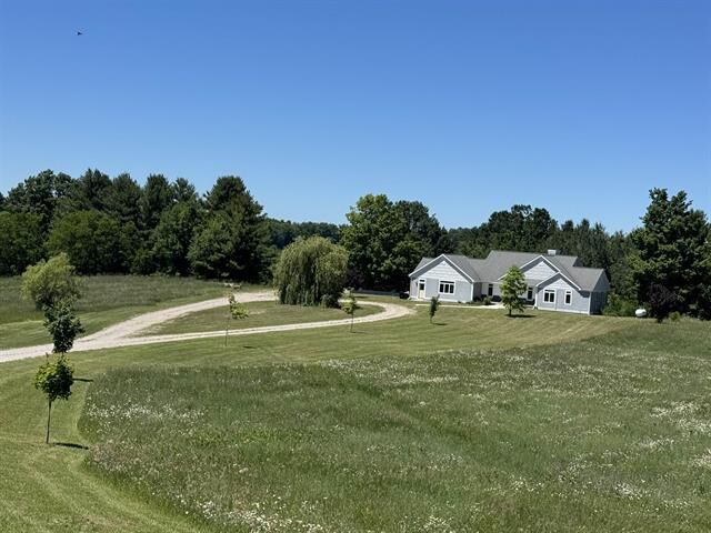 Property Photo: 8255 Angell Road MI 49690