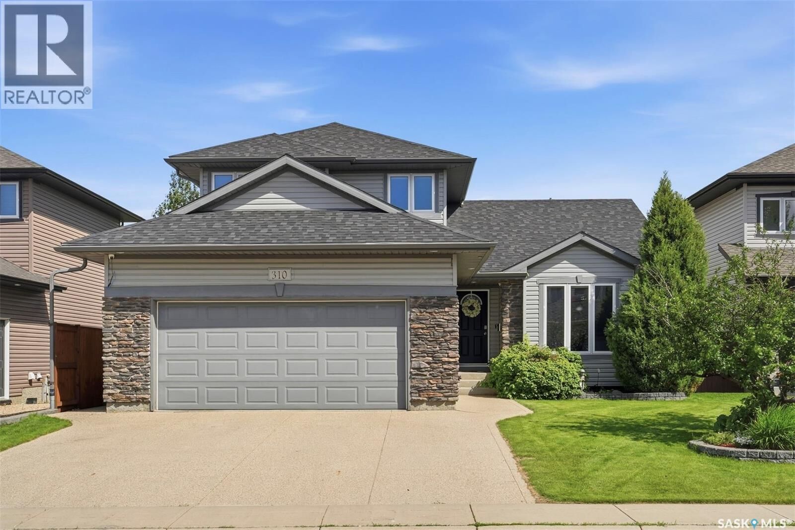 Property Photo: 310 Borlase Cove SK S7T 0B7