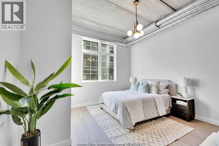 Property Photo:  11941 Tecumseh Road East 404  ON N8N 1L8 