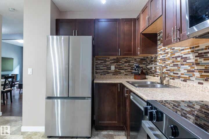 Property Photo:  100 Forest Grove  AB T8N 3K6 