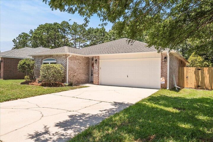 Property Photo:  6395 Heronwalk Drive  FL 32563 